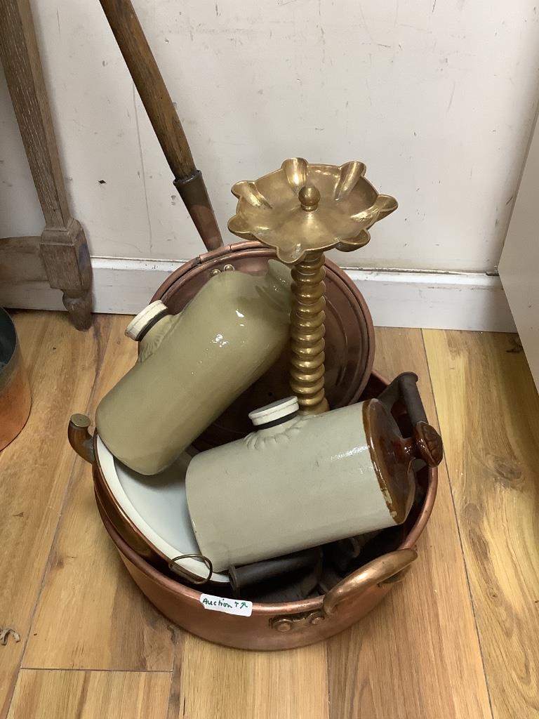 A group of mixed copper, brass and stoneware